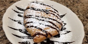 Pastry dessert with chocolate sauce